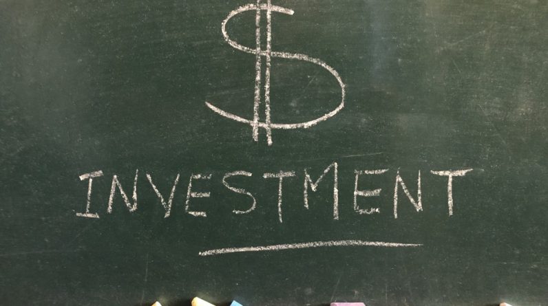 investment written in chalk on a chalkboard creative concept banking and finance t20 NxQKZQ